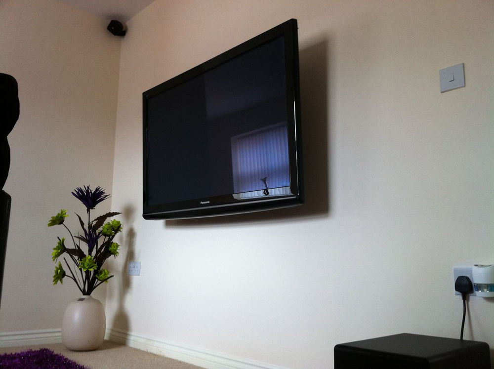 TV mounting service Professional TV wall installation
