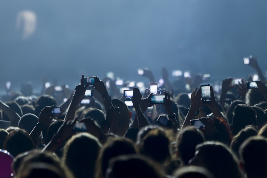 Cameras are destroying the beauty of live music, and here's why
