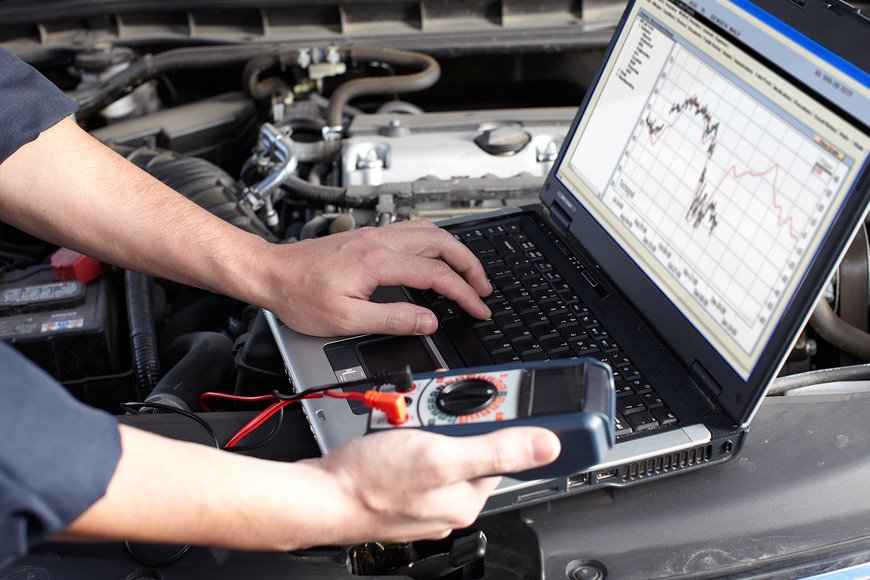 Professional car mechanic working in auto repair service. Harmony Motor