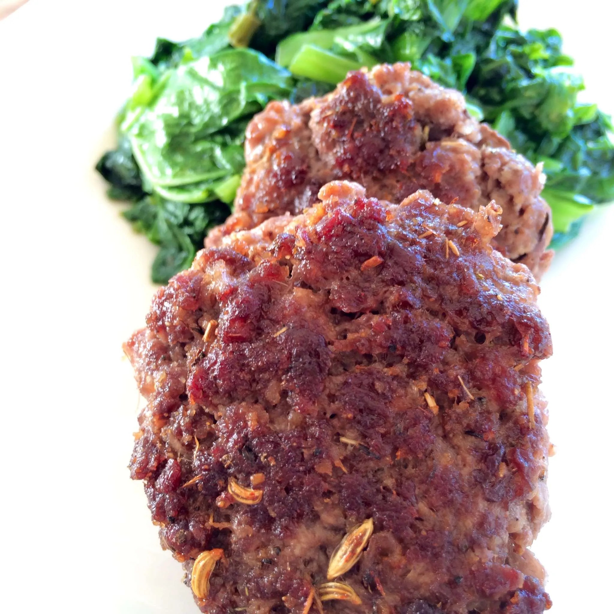 Wild Venison Breakfast Sausages with Sauteed Mustard Greens