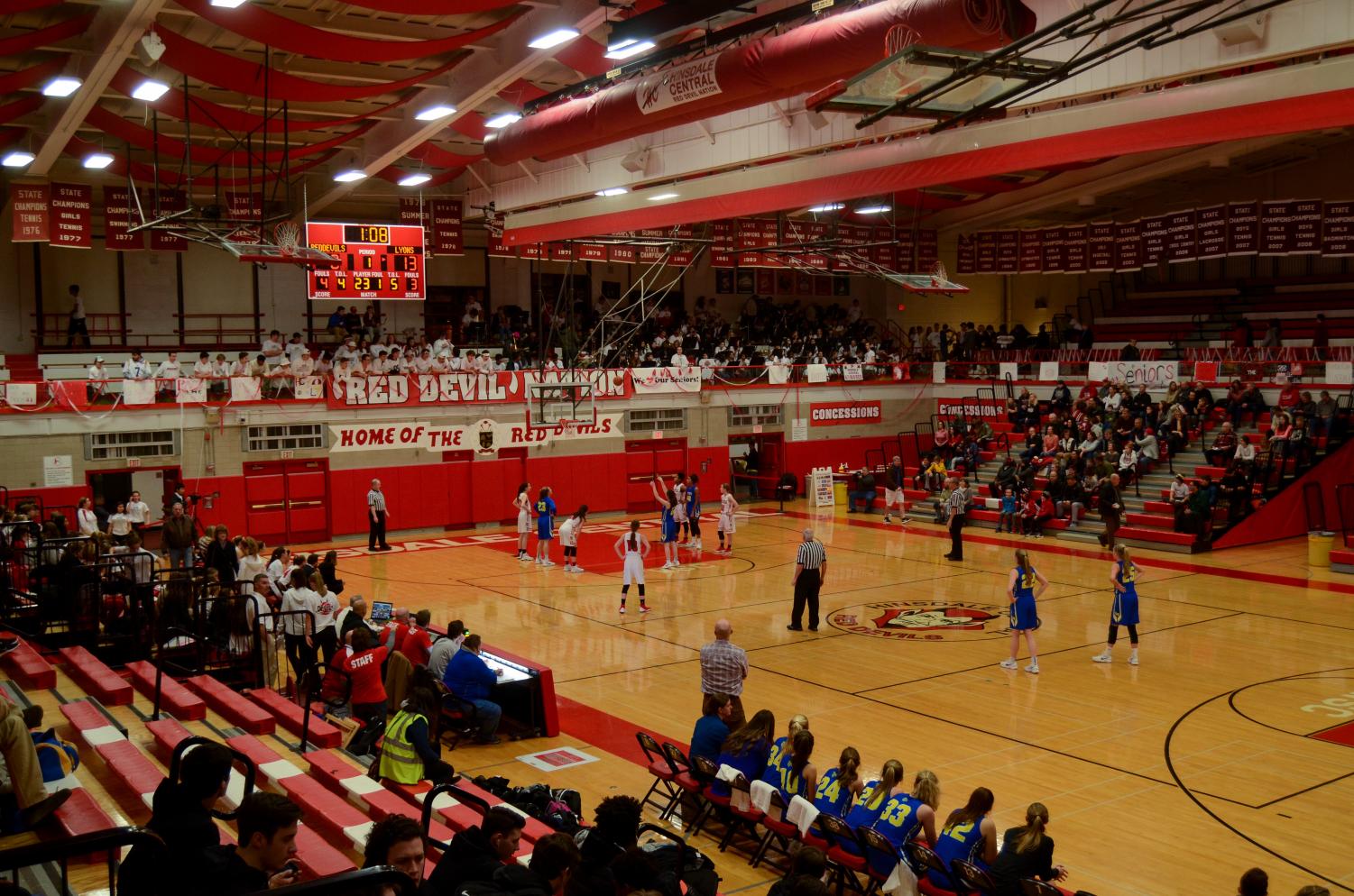 Varsity basketball teams host rival Lyons Township Devils' Advocate