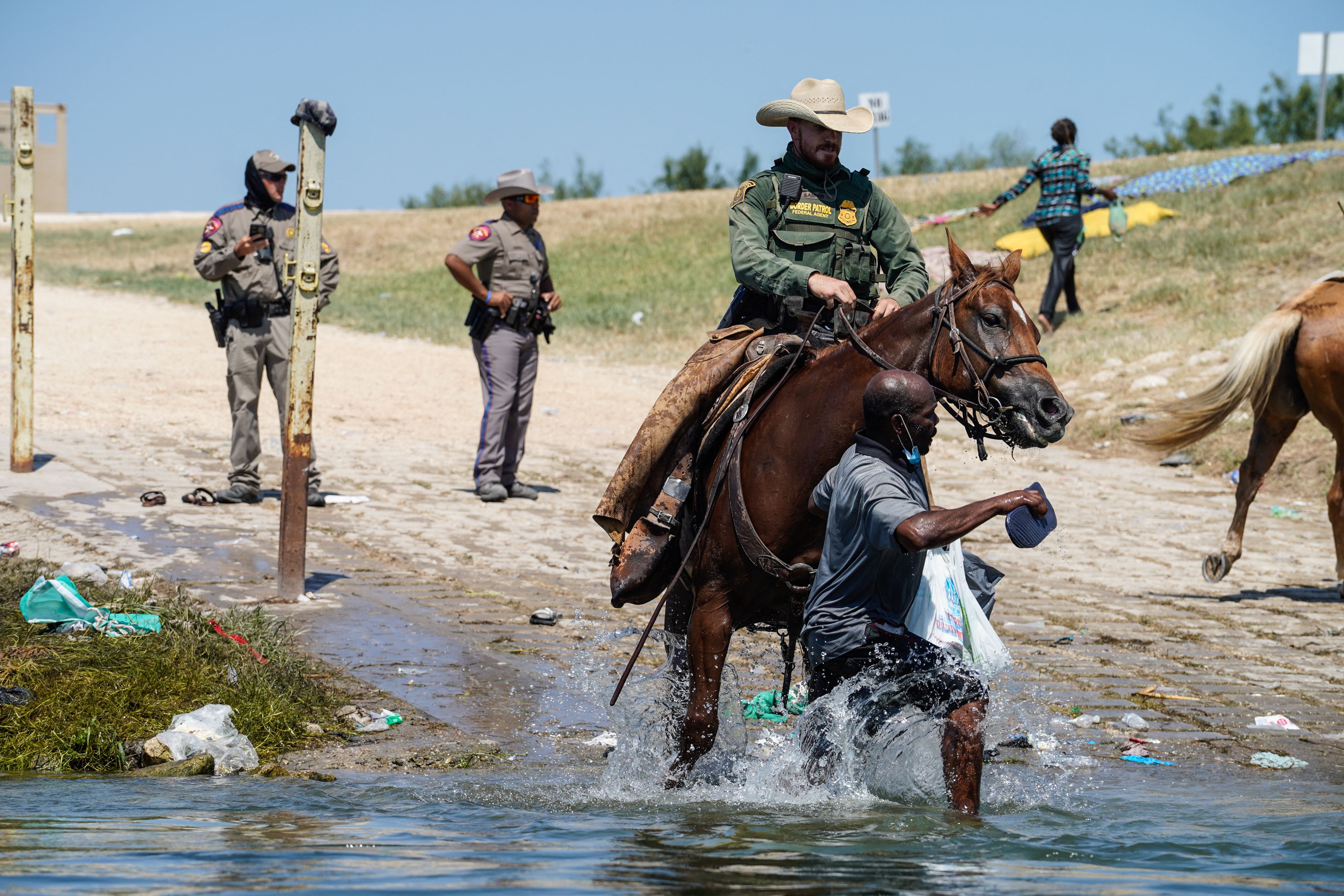 PHOTOS Did Border Patrol Agents on Horses Use Whips?