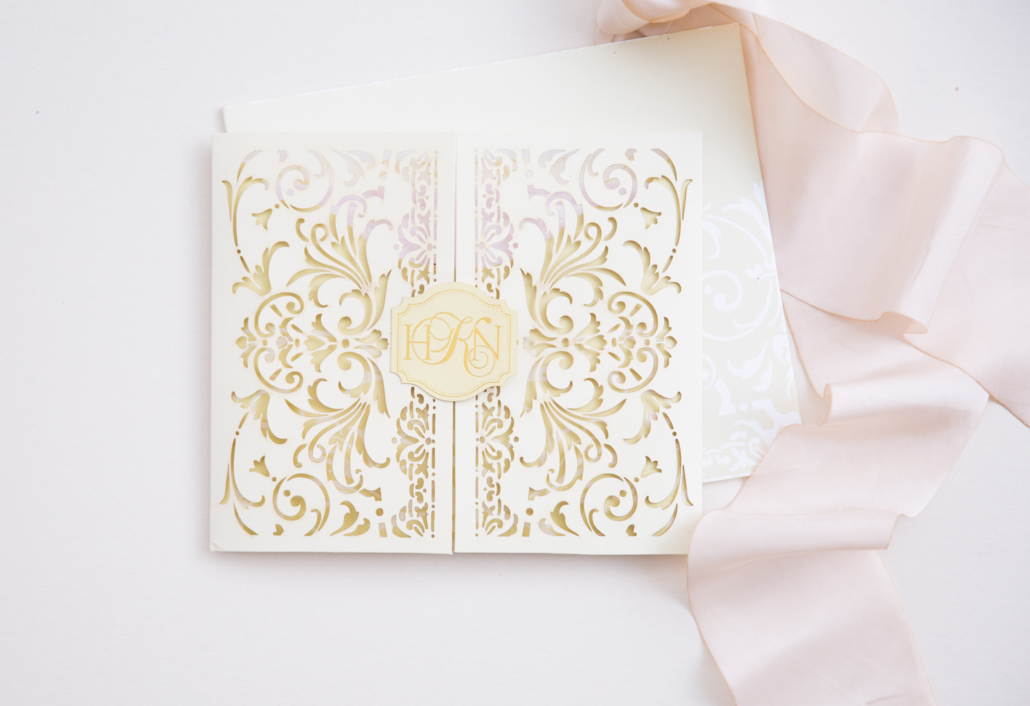 IVORY LASER CUT GATEFOLD INVITATIONS