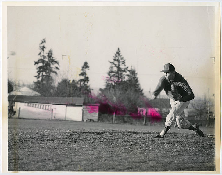 Unidentified student pitching during baseball game · heritage