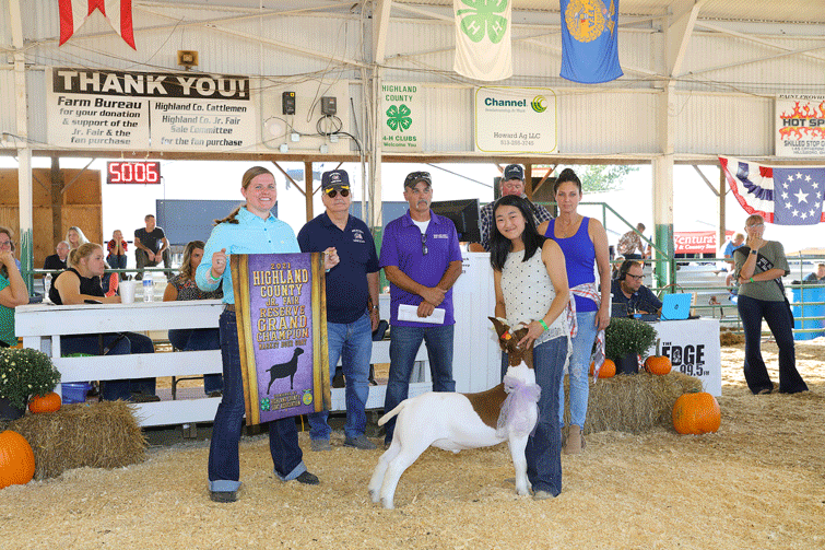 Wyatt Osborn exhibits Grand Champion Market Boer Goat The Highland