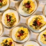 Deviled eggs with bacon and jalapeno.