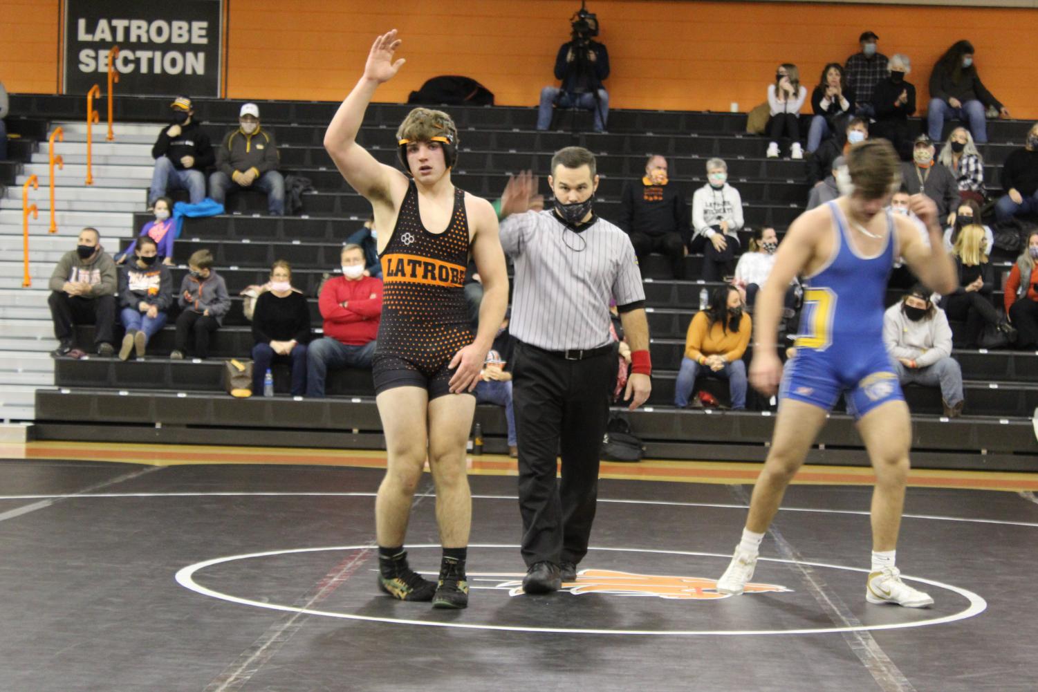 Wildcat Wrestling Pins Down A Win Against Crosstown Rivals With