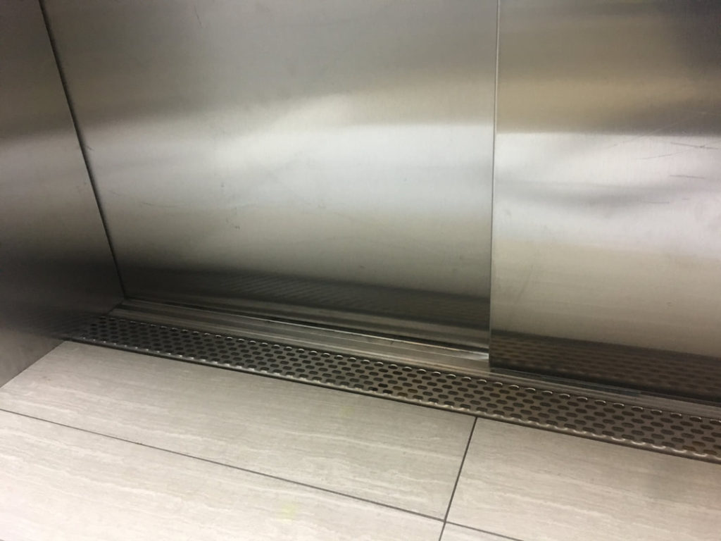 Integrated Elevator Sill Drains High Rise Solutions, LLC
