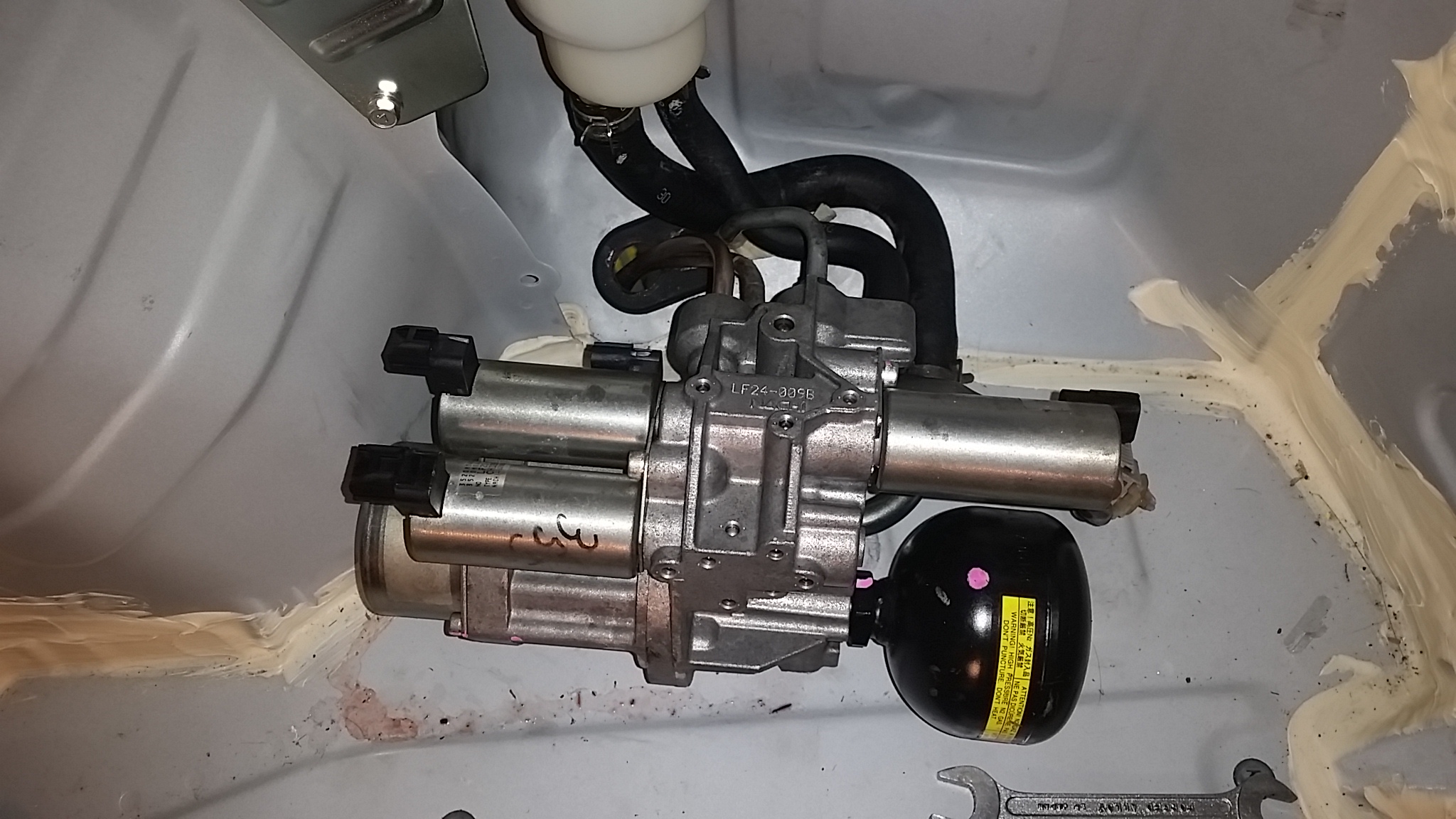 I trunk mounted my ayc/acd pump cheap and easy Mitsubishi Lancer