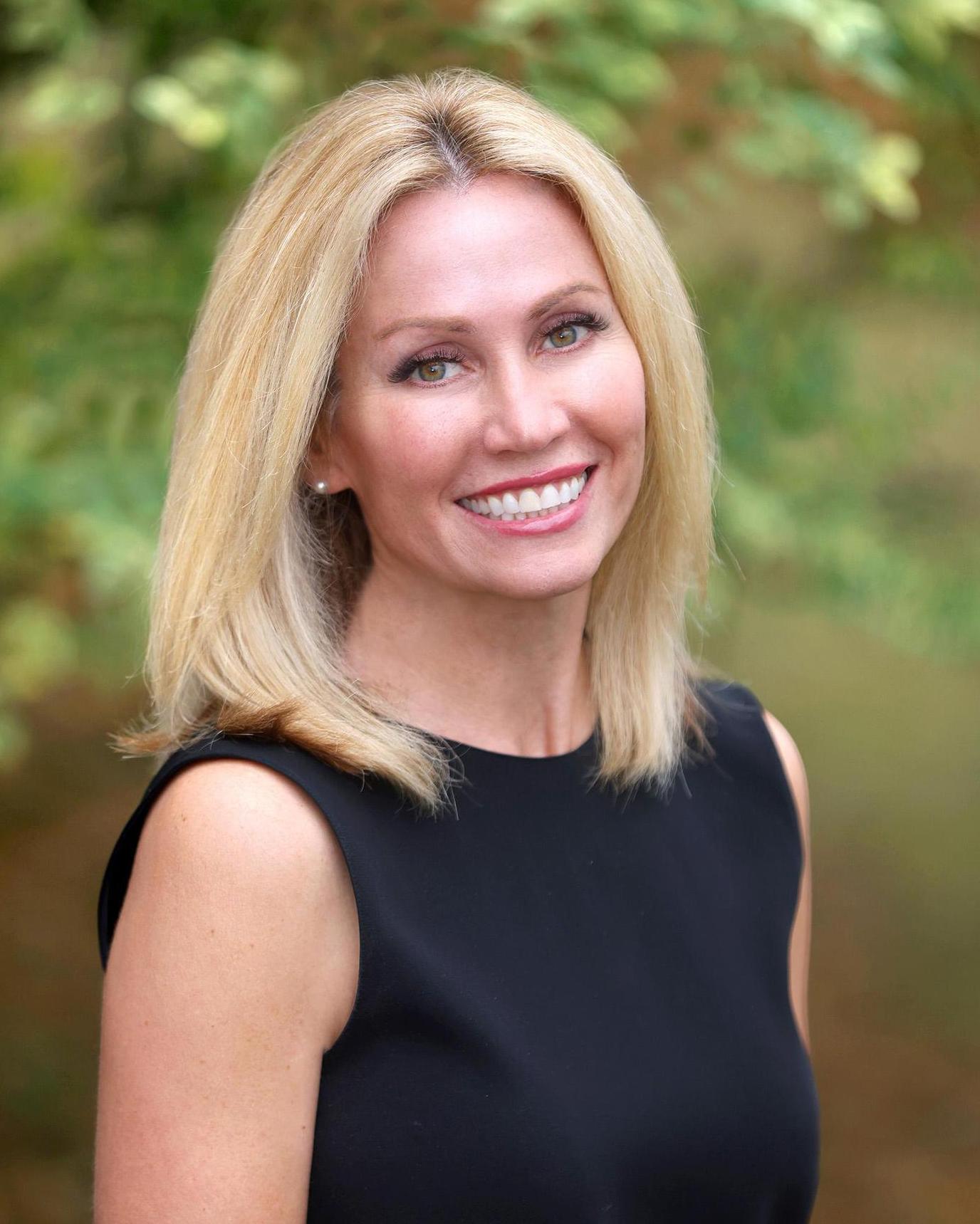 Tiffany White Corcoran HM Properties