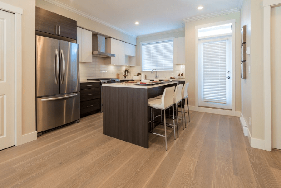 What Is the Difference Between Laminate and Hybrid Flooring