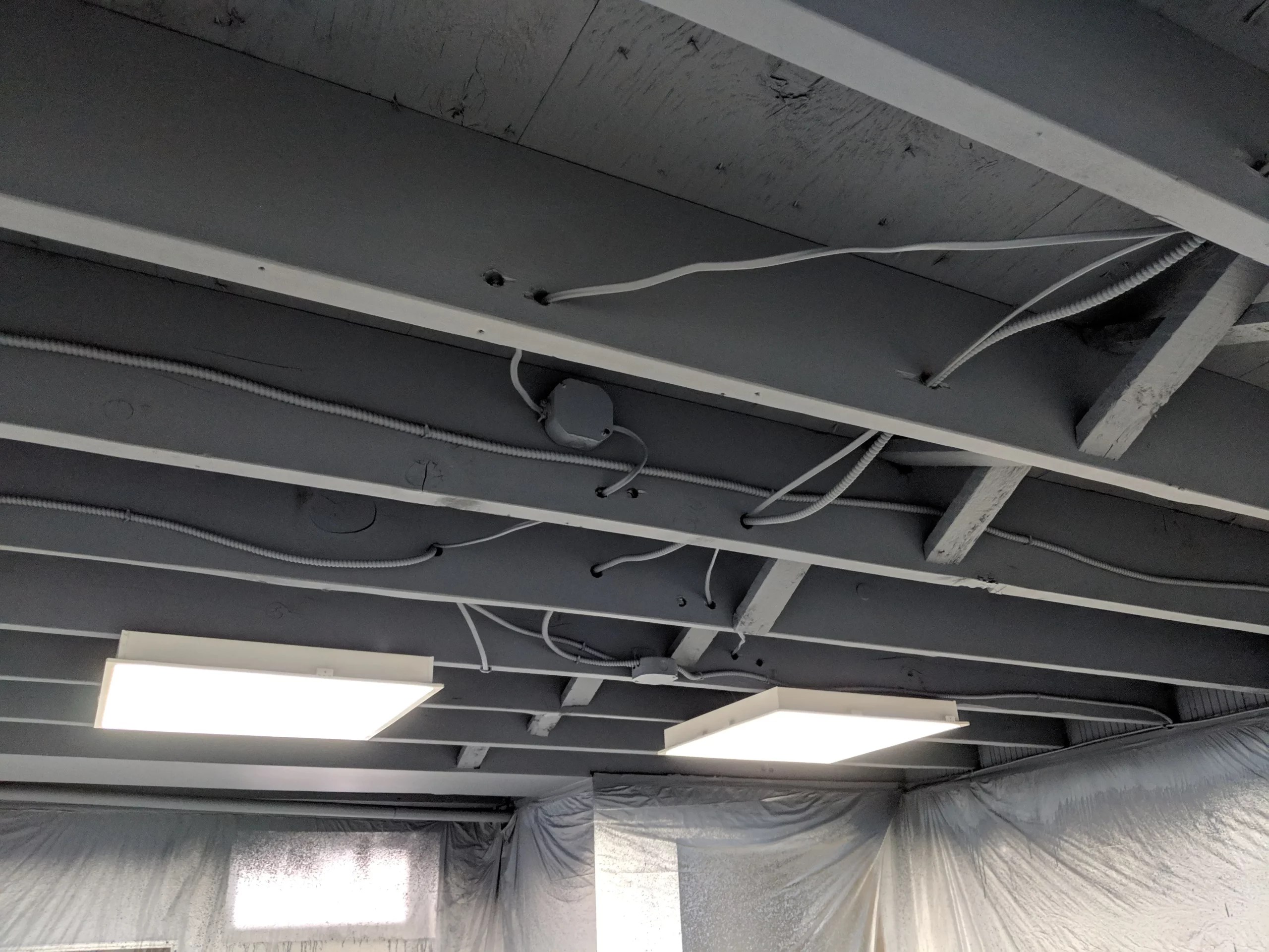 Painting an Unfinished Basement Ceiling to Elevate Your Space