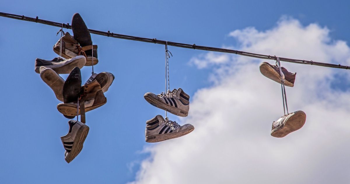 The Meaning Behind Shoes Strung Up On A Power Line Homemaking 101 Daily