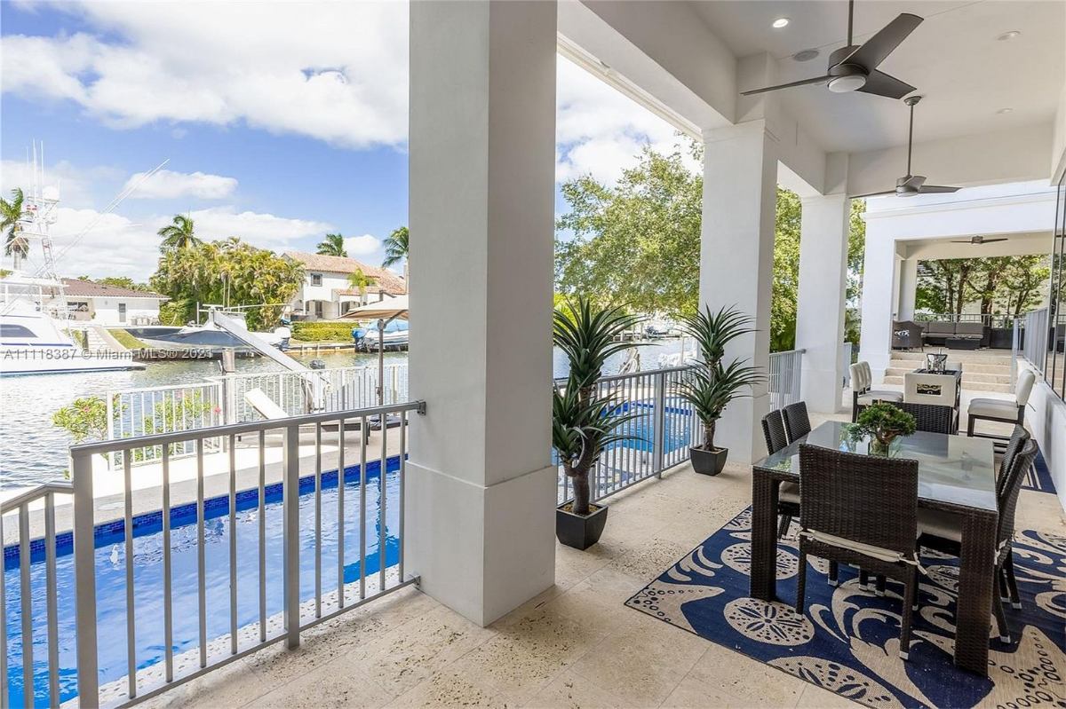 Home Of The Day A Luxe Waterfront Estate In Prestigious Gables By The Sea