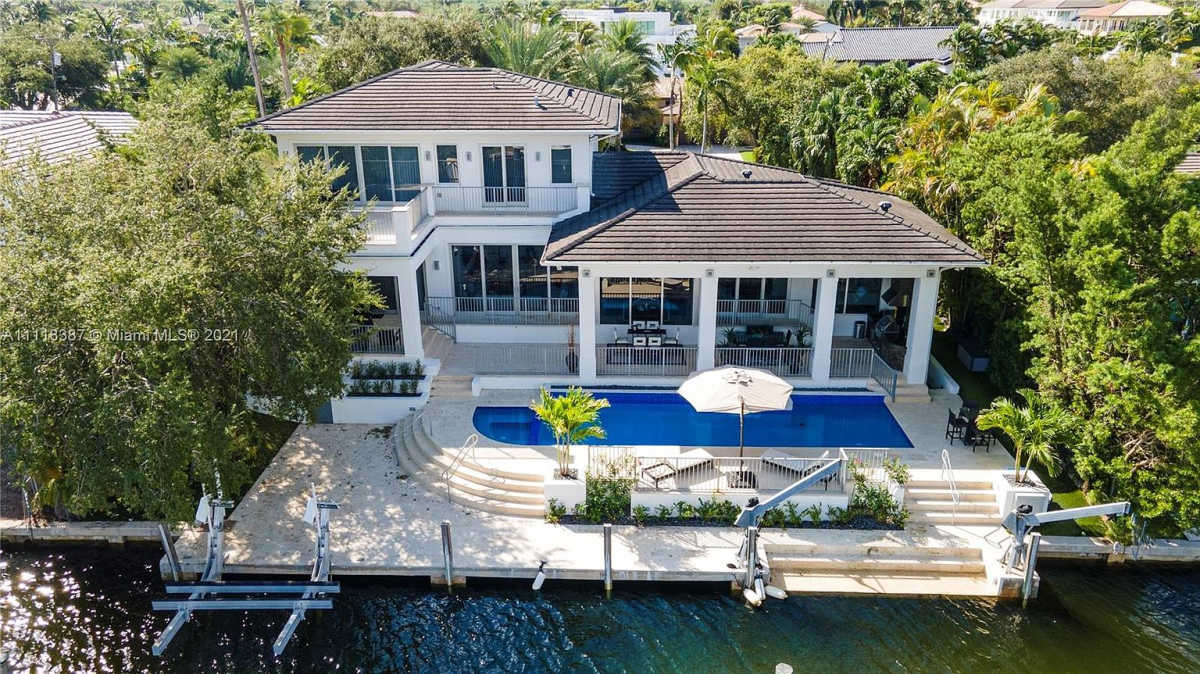 Home Of The Day A Luxe Waterfront Estate In Prestigious Gables By The Sea