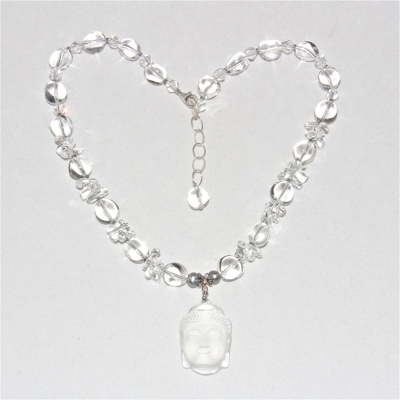 Quartz Crystal Buddha Head Necklace Honoring the Sacred