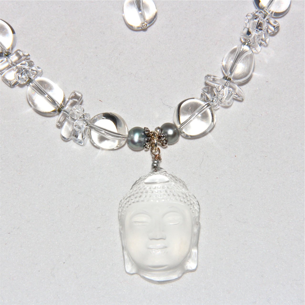 Quartz Crystal Buddha Head Necklace Honoring the Sacred