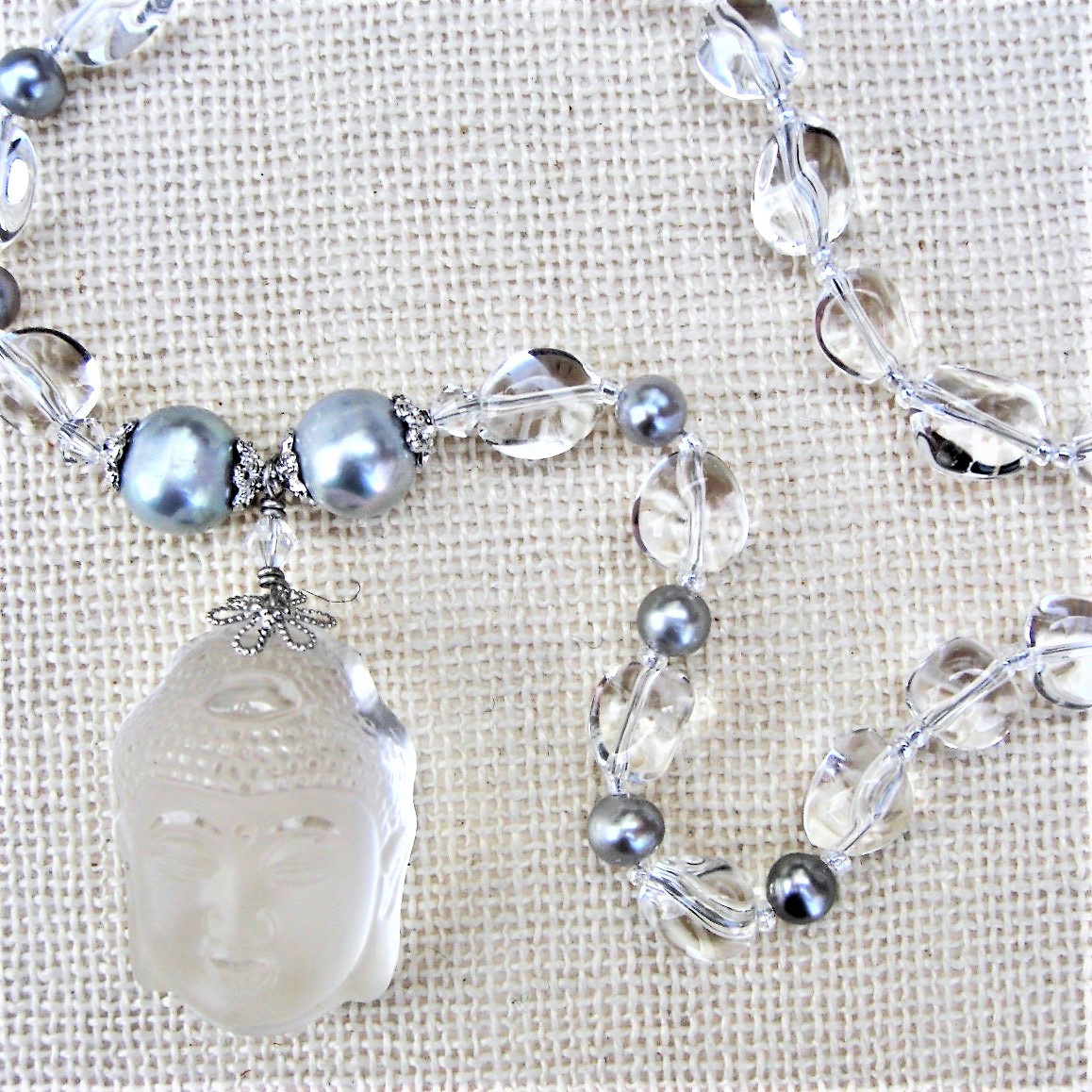 Quartz Crystal Buddha Head Necklace Honoring the Sacred