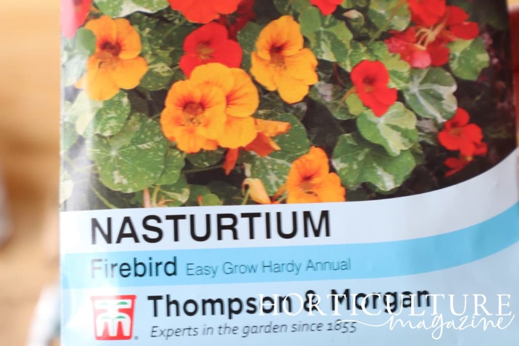 a seed packet from Thompson & Morgan labelled ‘Nasturtium Firebird - Easy Grow Hardy Annual’