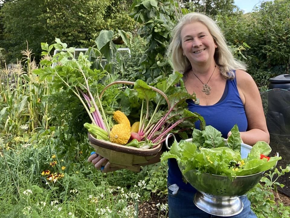 Stephanie Hafferty with her harvested vegetables in the garden