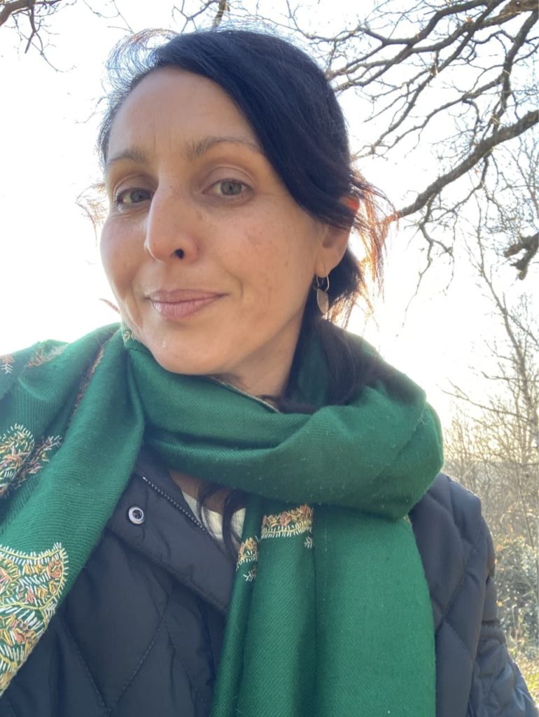 Sonya Patel Ellis in a garden on a winter’s day