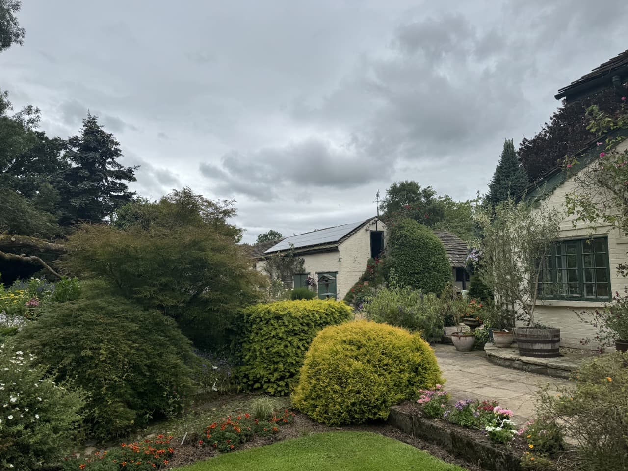 the house at Rowley house surrounded by herbaceous plantings and shrubs