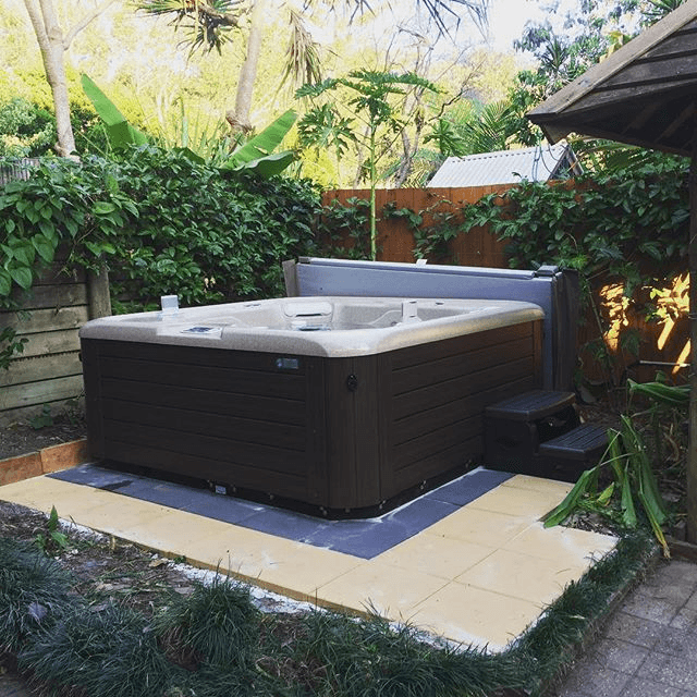 OUTDOOR HOT TUB LANDSCAPING IDEAS TO INTEGRATE YOUR HOME SPA SEAMLESSLY