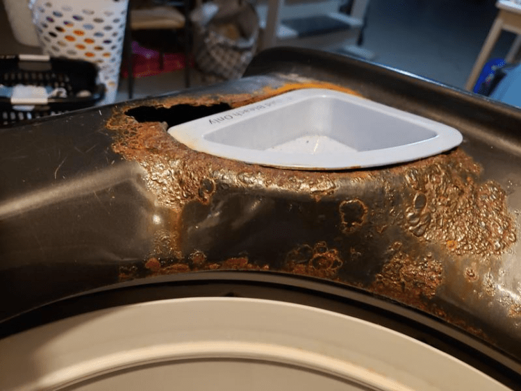 What are black flakes in washing machine Causes and 5 Methods to