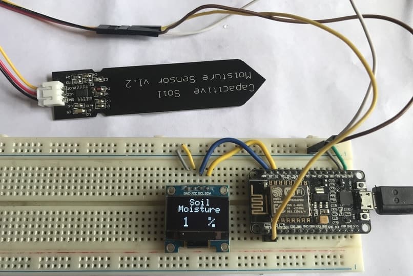 Capacitive Soil Moisture Sensor with ESP8266/ESP32 & OLED