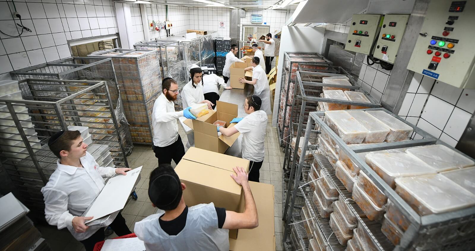A staple in Jerusalem Pantry Packers helps fill shopping carts during