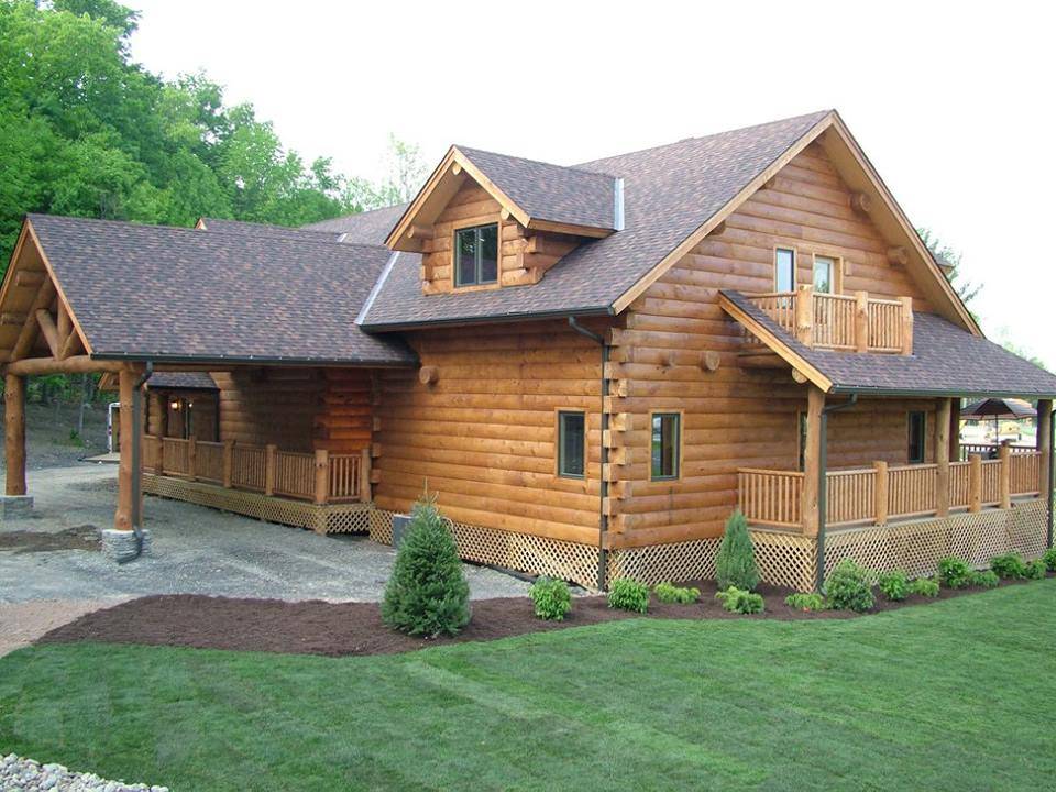 The Big Sky Log Cabin Features Plenty Of Windows And High Ceilings