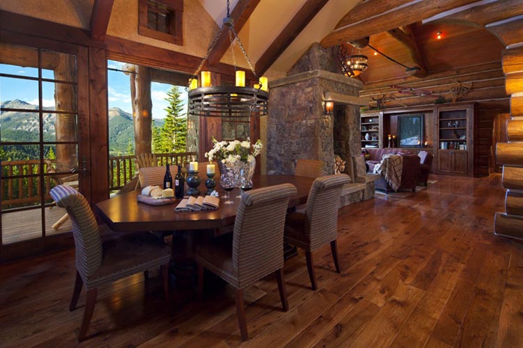 The Big Sky Log Cabin Features Plenty Of Windows And High Ceilings