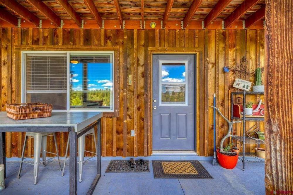 This Amazing Log Home With Deck Looks Out Over The 10 Acres