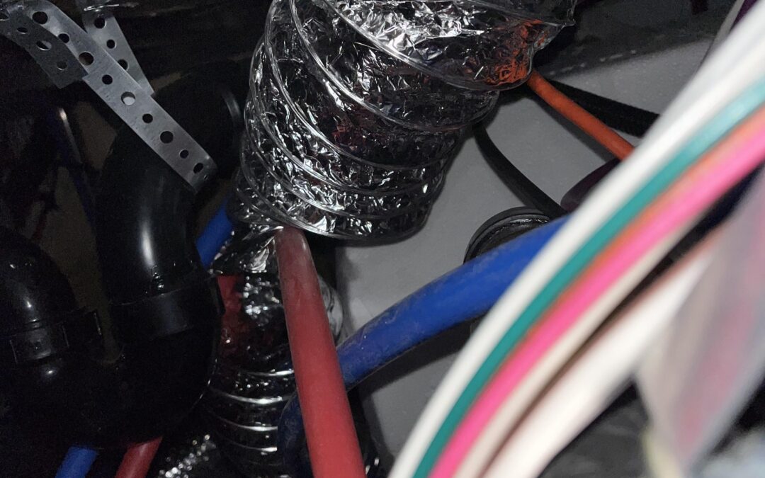 Is this my furnace heat duct that’s cut in half with a water line