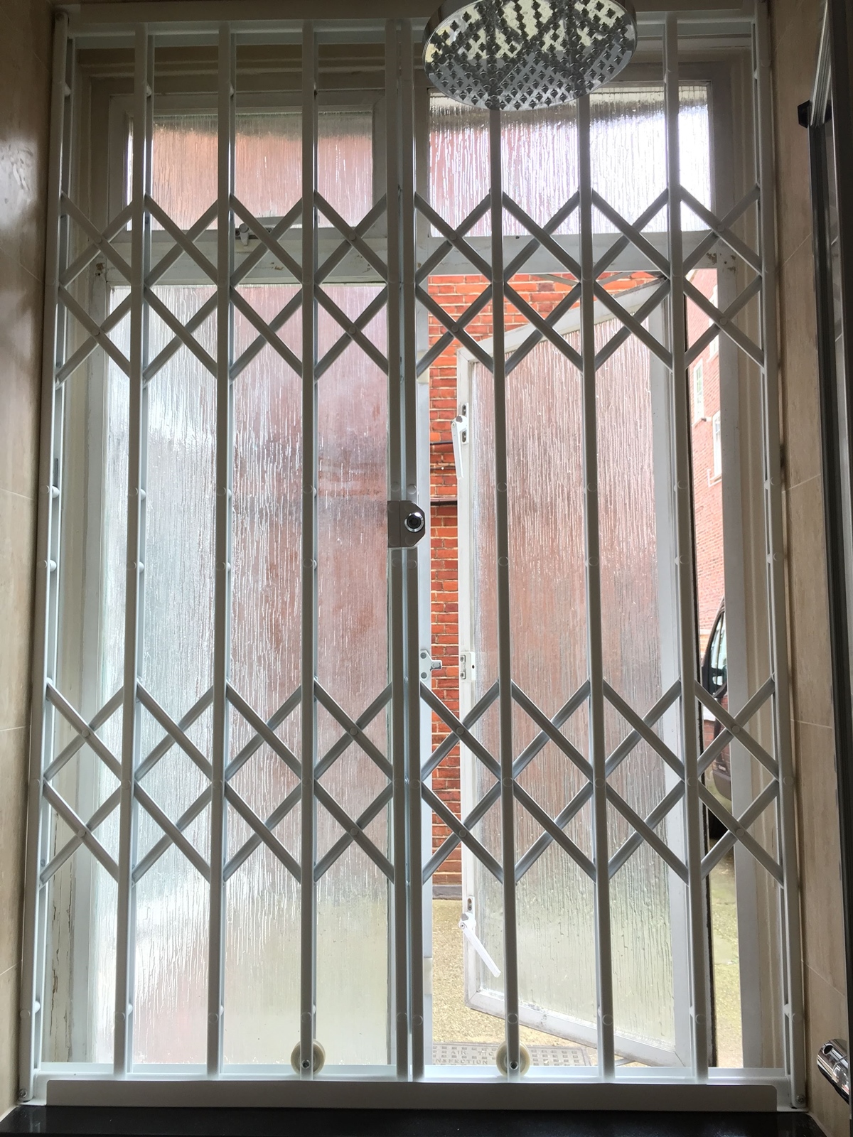 Concertina Gates Home Protection Security Grilles Ltd