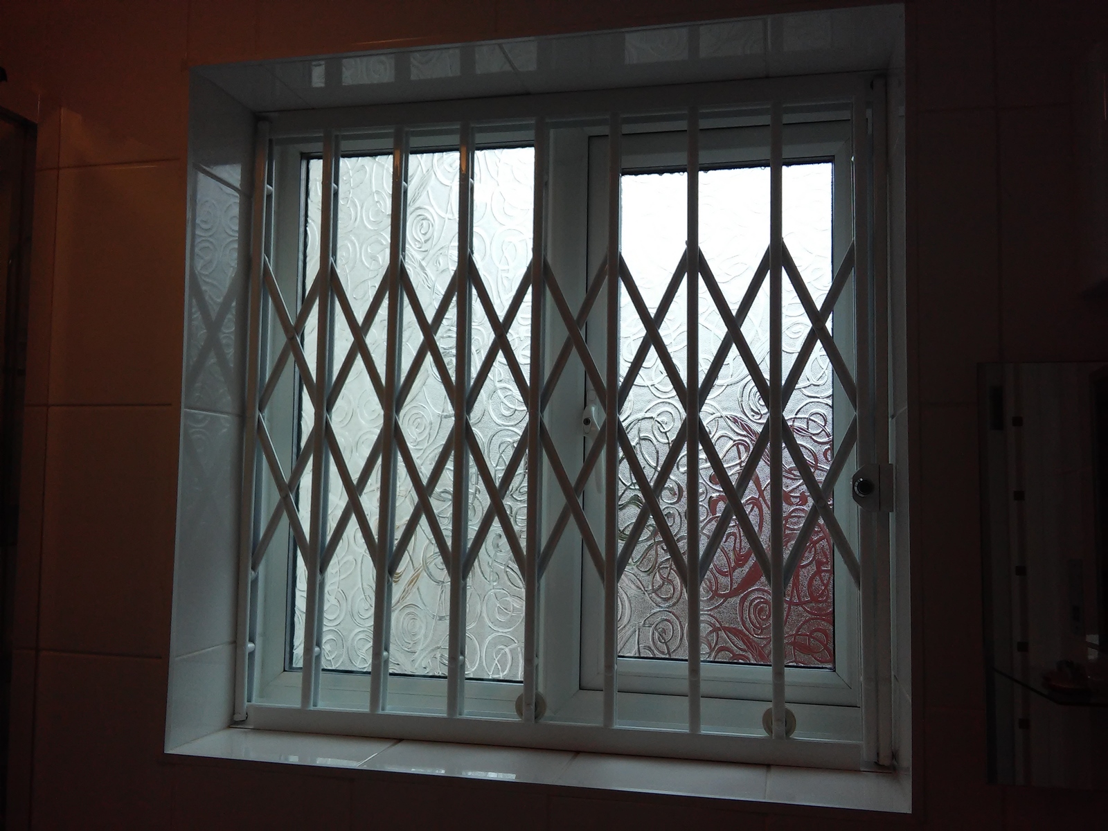 Concertina Gates Home Protection Security Grilles Ltd