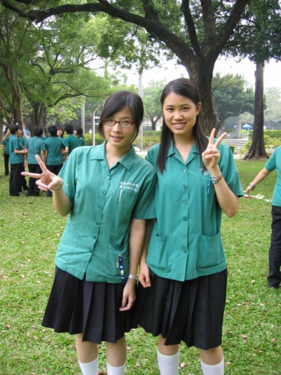 Image may contain: one or more people, people standing, tree and outdoor