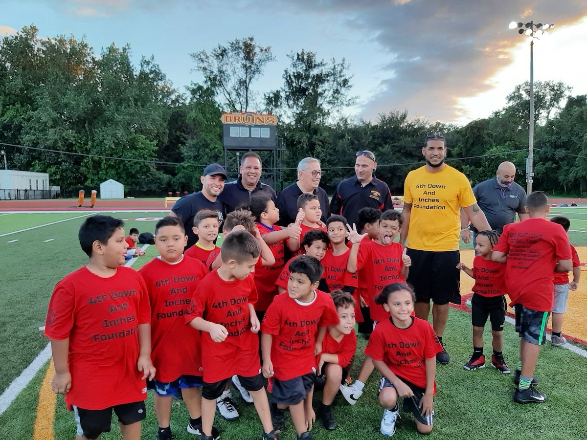 Former NBHS QB & NFLer Hosts Football Camp at Bruins Stadium Hudson TV