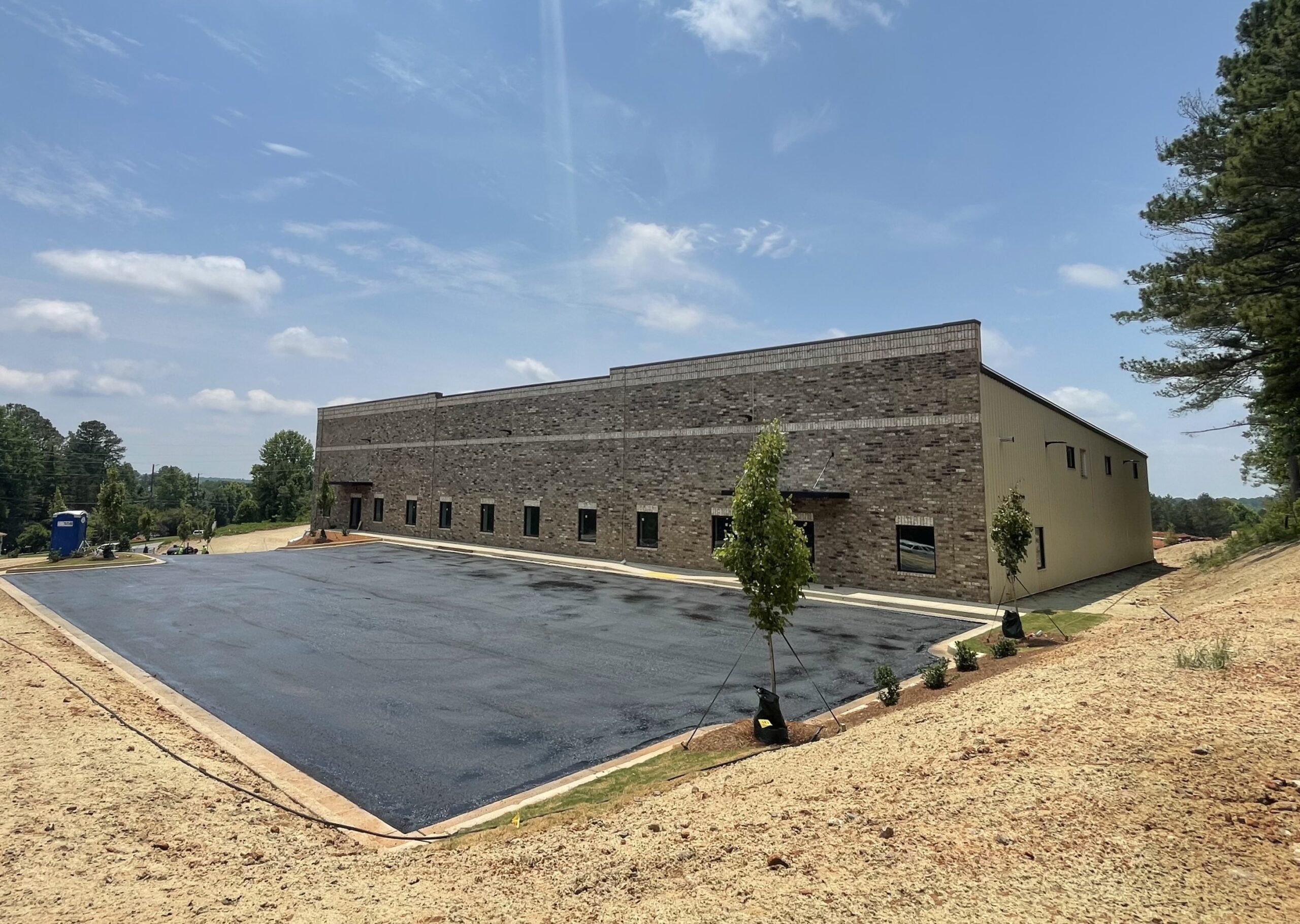 Crossroads Business Center Hughes Commercial Real Estate, Inc.