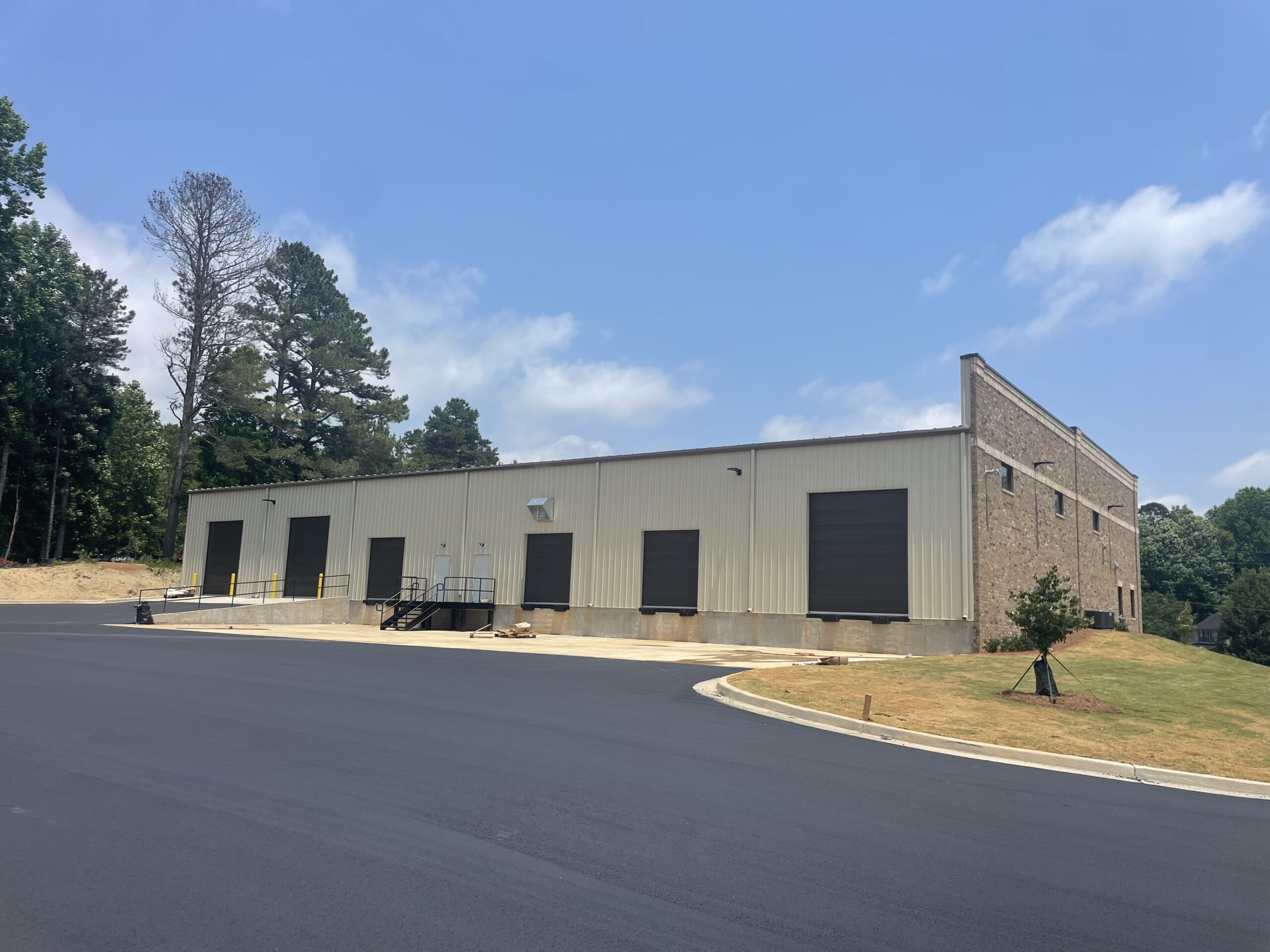 Crossroads Business Center Hughes Commercial Real Estate, Inc.