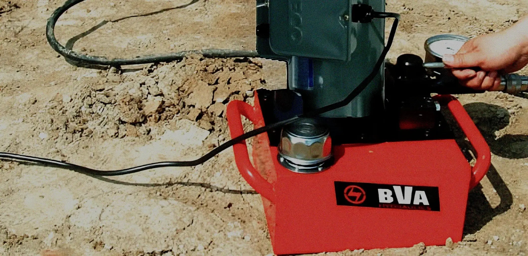 Multiple hydraulic pumps installed on an industrial machine.