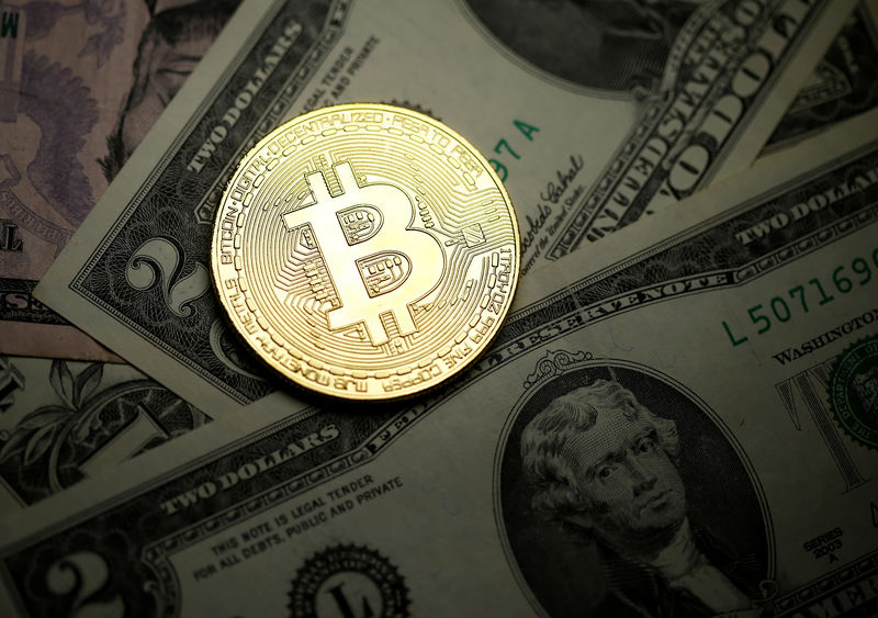 Cryptocurrencies' total value hits record high as bitcoin
