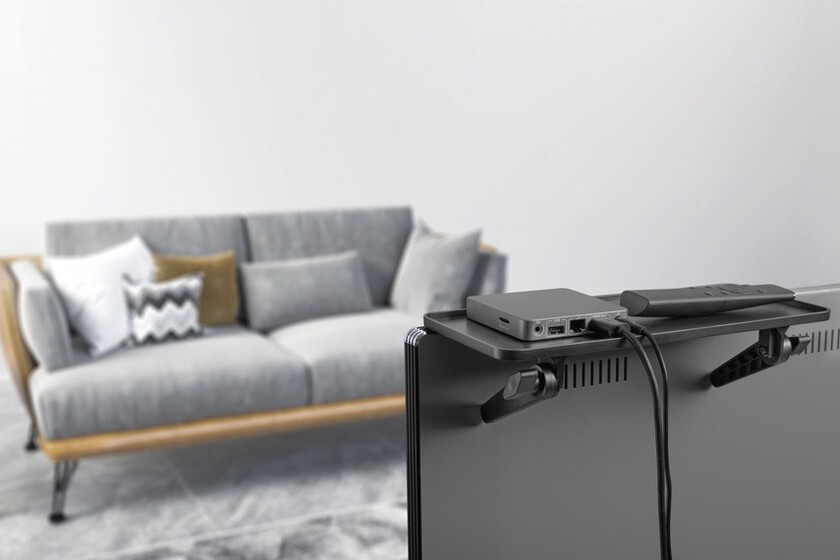 This cheap shelf is placed above the TV, and allows you to improve the