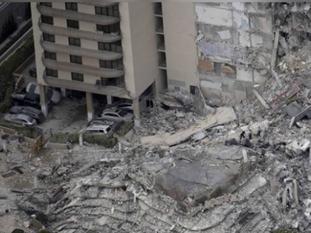 One dead, dozens unaccounted for in Florida apartment block collapse
