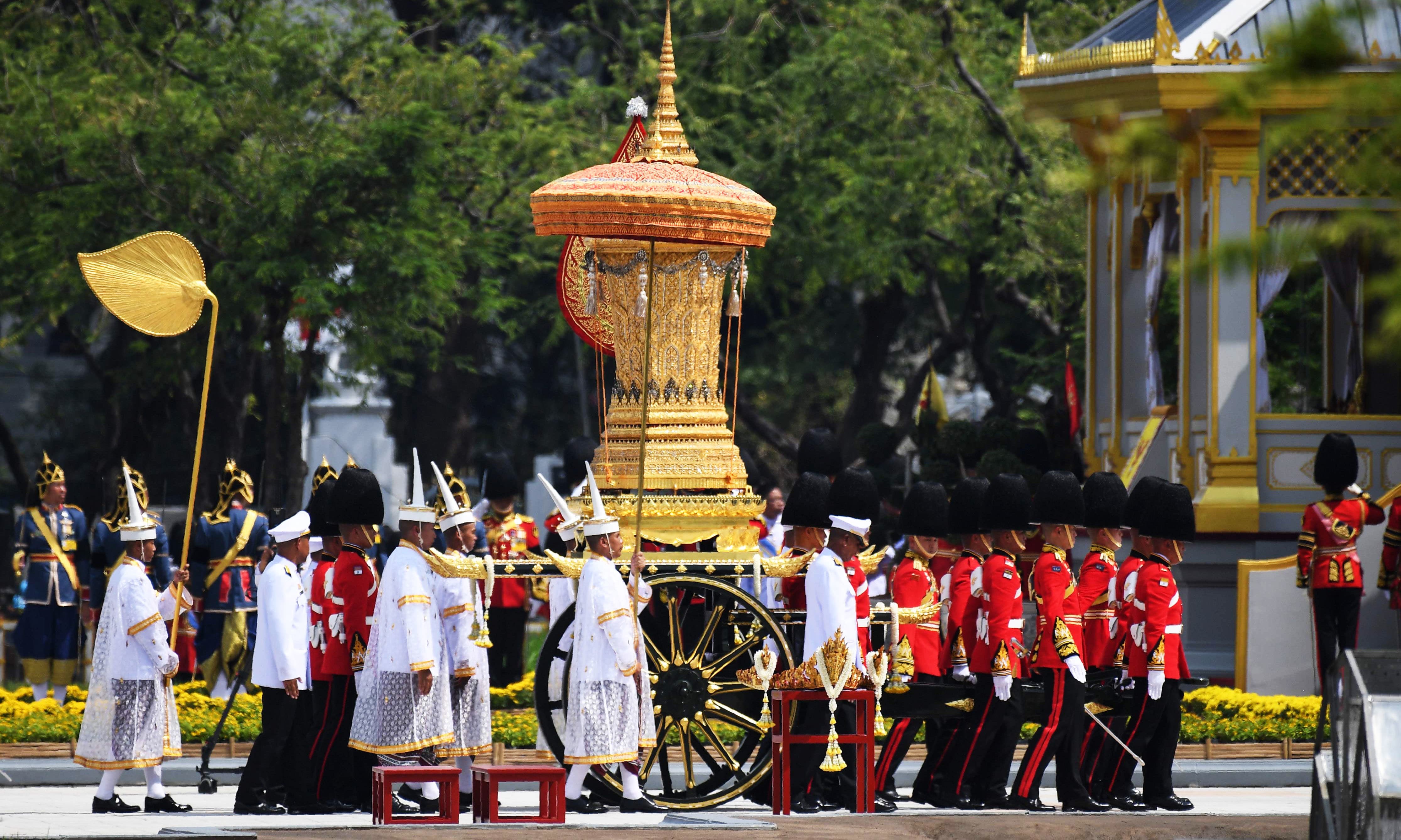 Thailand turns black and gold for late King's grand funeral World