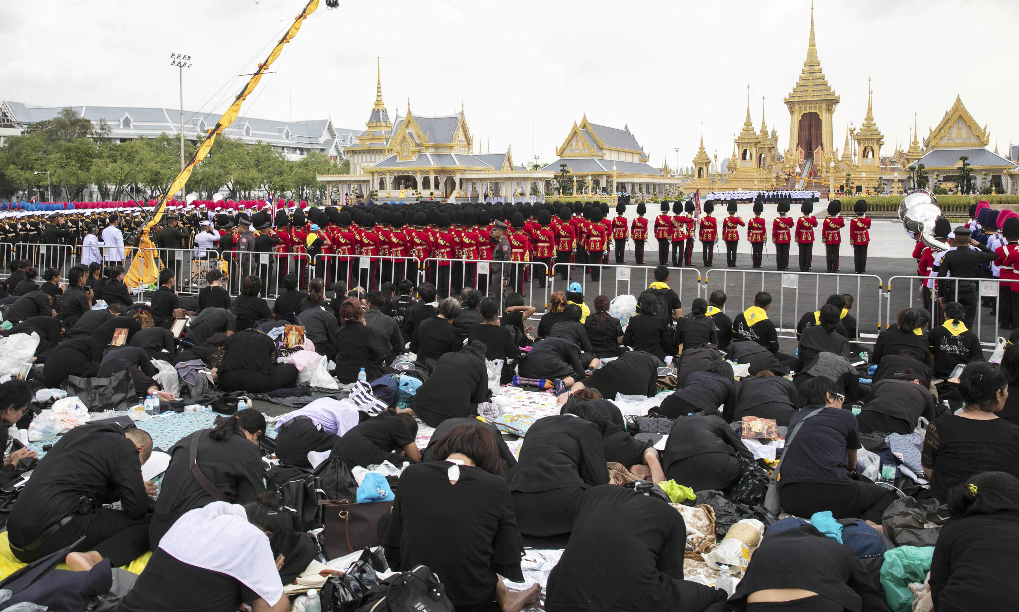 Thailand turns black and gold for late King's grand funeral World
