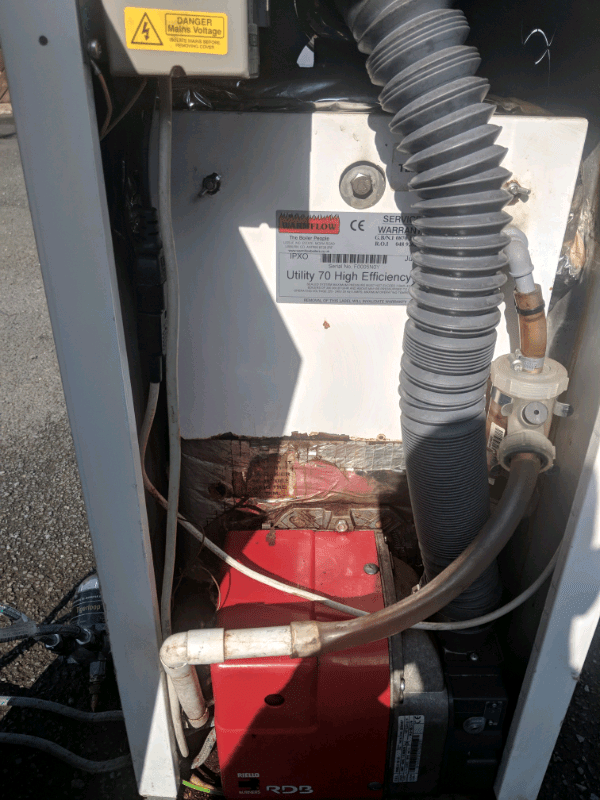 Warmflow 70 condensing high efficiency oil fired boiler and burner in