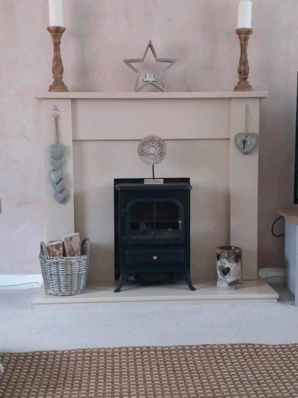 Fire surround hearth and electric log burner in Coxhoe, County Durham