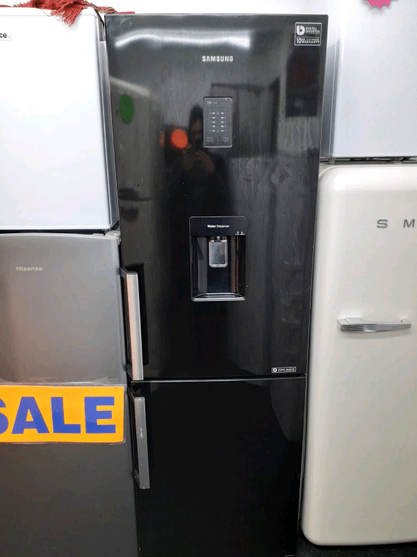 Black Samsung fridge freezer with water dispenser in Liverpool City