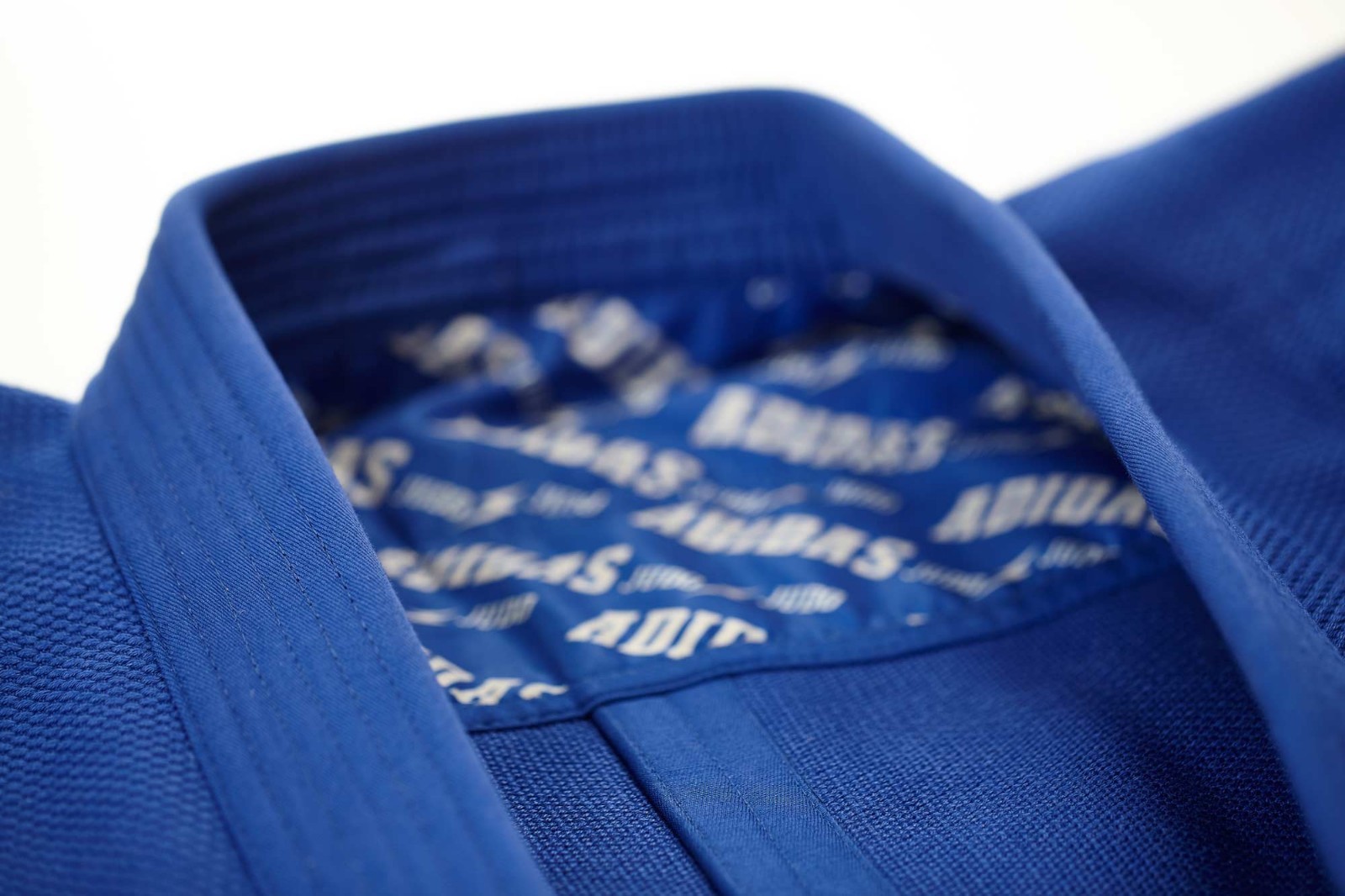 adidas JudoAnzug "Millenium" blau/silbernes Logo J990B JudoAnzug